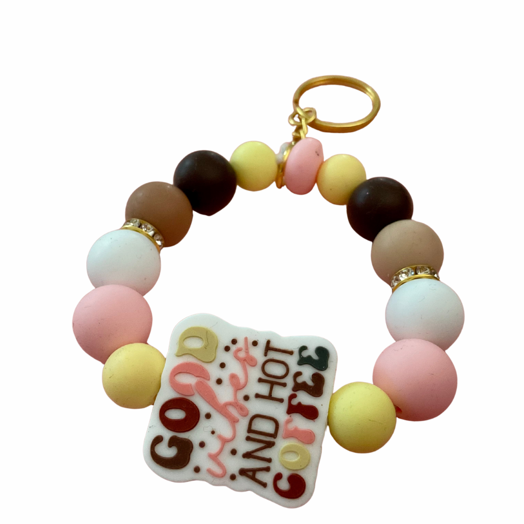 Colorful beaded keychain with a 'Good Day and Hot Coffee' tag on a white background